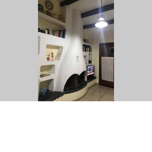 Casita blanca con fibra óptica y piscina cominutaria