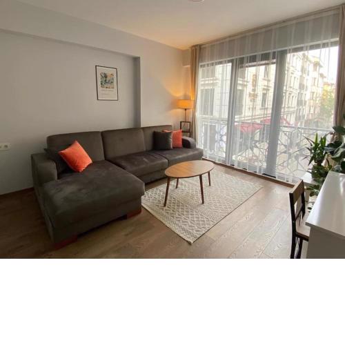 Central 1BR Apartment with Balcony in a New Building