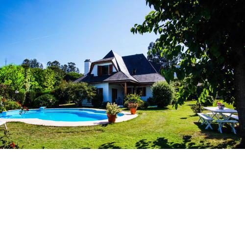 Chalet con piscina y 2000 m de jardín