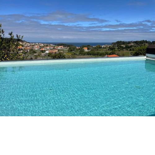 CHALET CON VISTAS AL MAR, PISCINA, PISTA FUTBOL...IDEAL PARA FAMILIAS CON NIÑOS