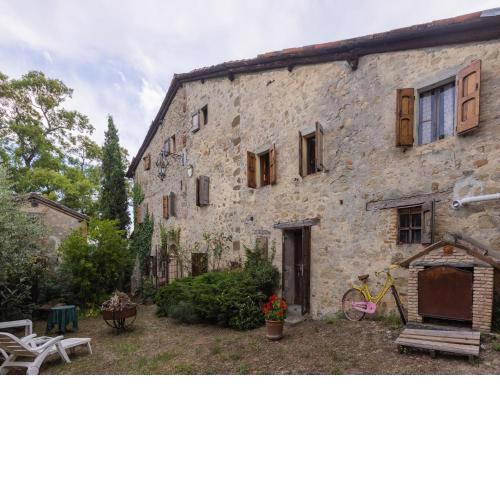 Cheerful holiday home in Vergato with garden