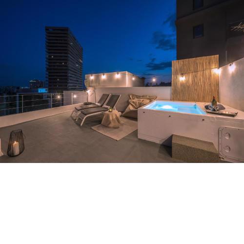 City-View Penthouse with heated mini pool!