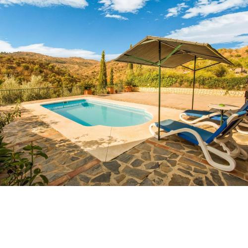 Classy Holiday Home in Guaro with Private Swimming Pool