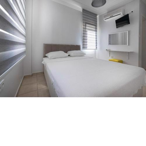Comfy Room with Shared Pool near Gumbet Beach