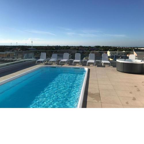 Condominio Quasar