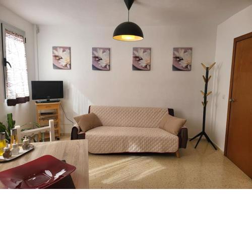 Coqueto apartamento en primera línea de mar