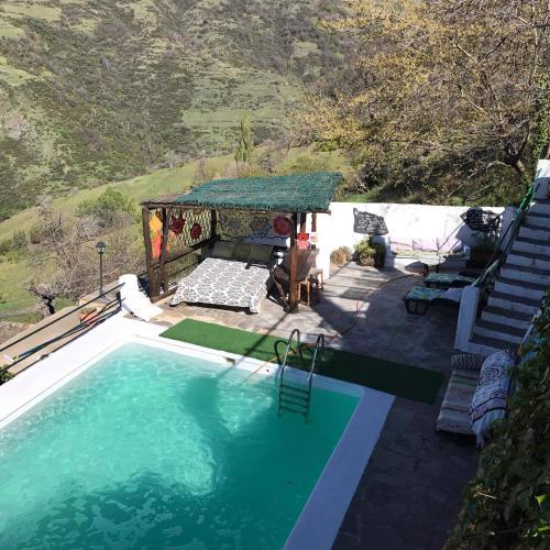 Cortijo en Bubion "Casa Ibero" Slow Alojamiento turistico rural VTAR GR 00516/ 00555
