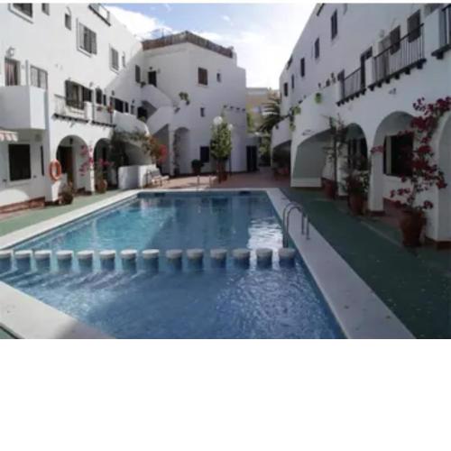 Cosy 3-bedroom Duplex with pool close to the beach