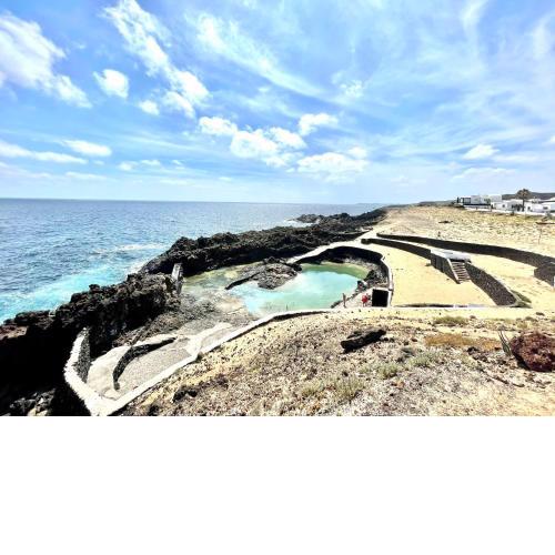 Cozy apartment with FreeWifi, near beach y Natural Pools in Charco del Palo