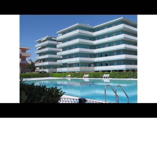 Cozy flat in a Residence with 12 swimming pools - tennis- childrens play area