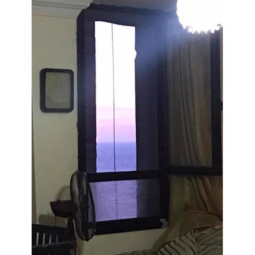 Cozy new 2 BD Amazing beach view Next to Hilton hotel Family only !العائلات فقط
