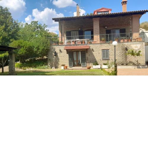 Delightful rooms with private bathrooms in an independent apartment with garden