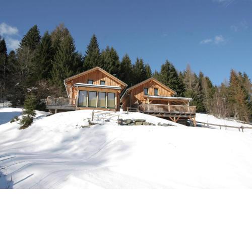 Detached wooden chalet in Stadl an der Mur Styria facing south with sauna