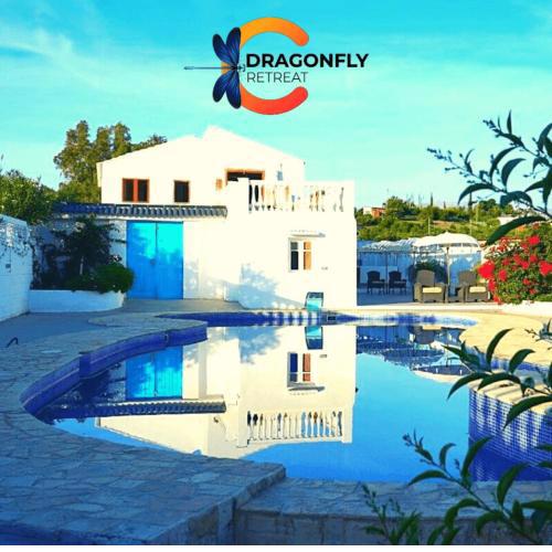Dragonfly Retreat Coin Malaga