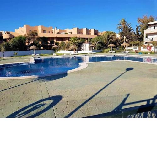 Duplex in Urb Naturista with patio swimming pools and access to naturist beach