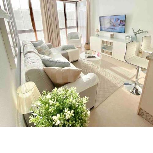 Elegante apartamento con piscina y mucho encanto.