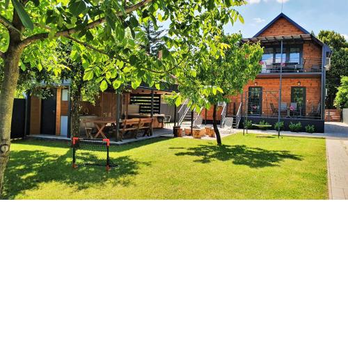 Erdőalja 11 Apartman