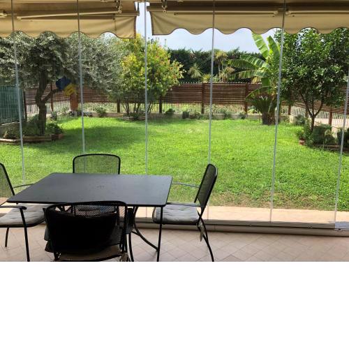 Eur elegante appartamento con giardino e posto auto