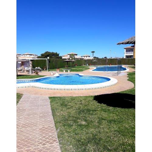 Fabulous detached large villa 5 bedrooms 3 bathrooms backing onto Villamartin Golf Course