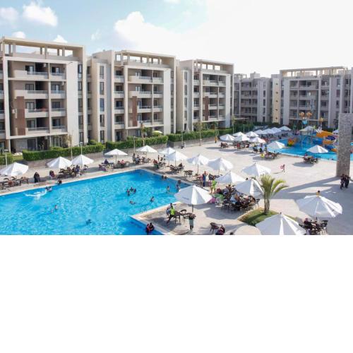 Family Chalet, Grand Hills Resort شاليه عائلي في قرية جراند هيلز الساحل