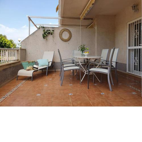 Fantastico bajo con Jardin en Playa de Canet