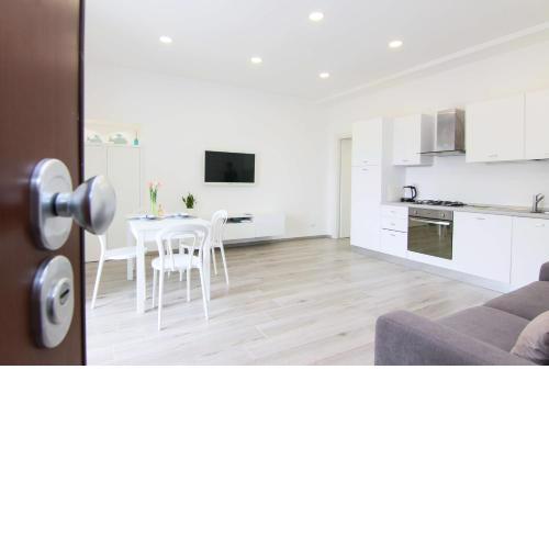 FOUR WHITE APARTMENTS