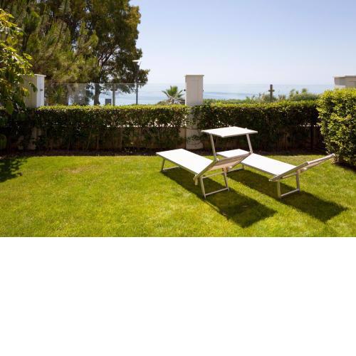 Frontline Beach ground floor apartment with private garden, Doncella Beach.