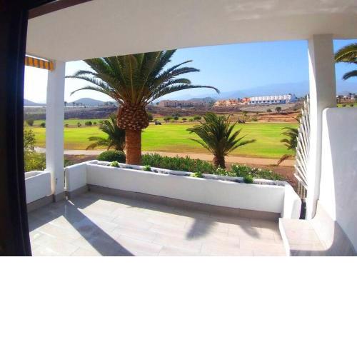 Golf view apartment with large communal pool
