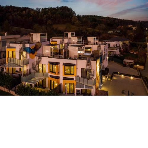 Graziös Luxusapartments mit Dachterrasse oder Garten, kostenlose Parkplätze, E-Tankstelle