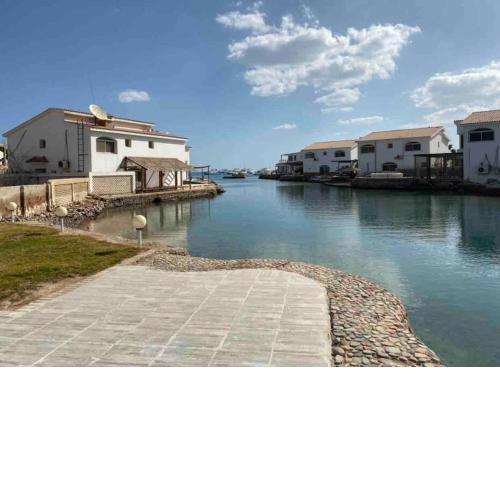 Great sea front villa with a private beach, pool