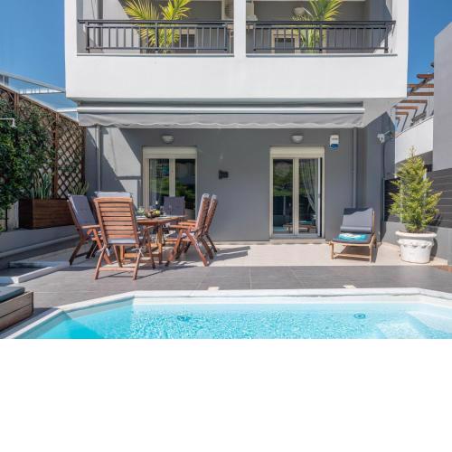 Grey House "by Checkin"