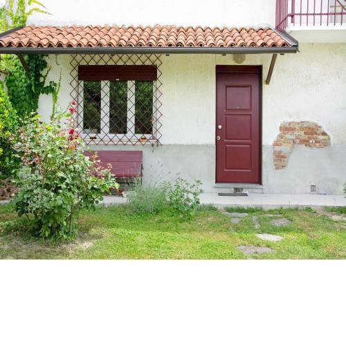 Holiday home in Asti overlooking a hill view from the garden