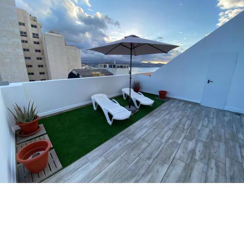 Holiday Home & Rooftop Lounge