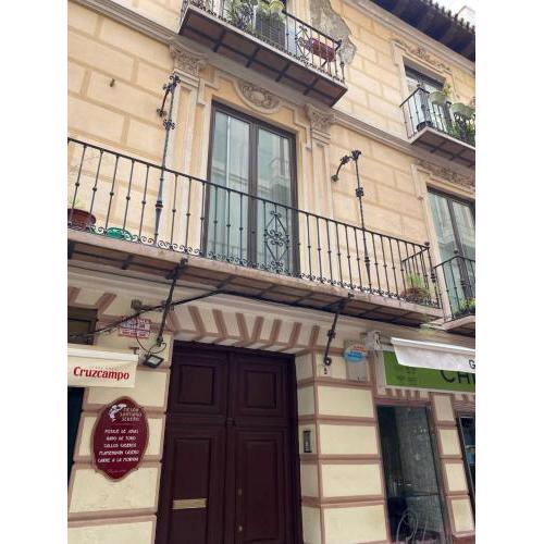 Holidays2malaga Correo Viejo next Cathedral Malaga with french balconies