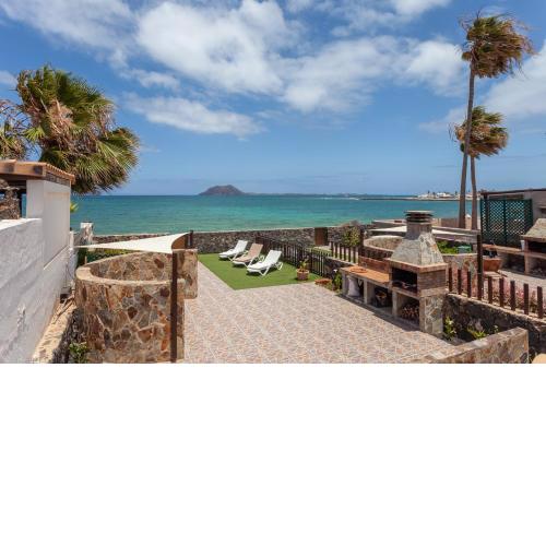 HolidayVilla Gran Marina with Seaview- Beachfront -Wifi - big Garden suitable for Families by HolidaysHome