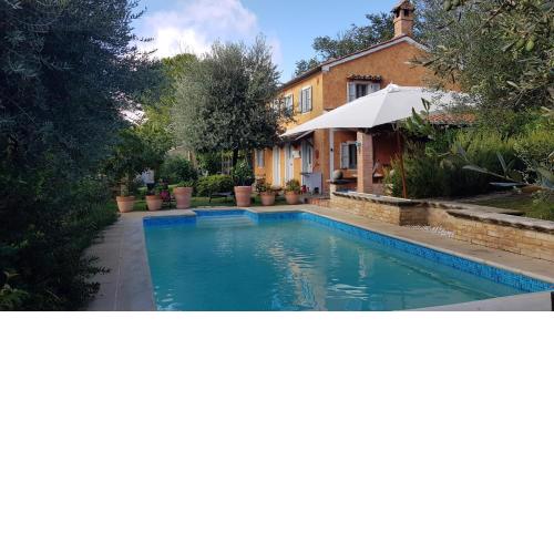 Home set in olive grove with stunning views