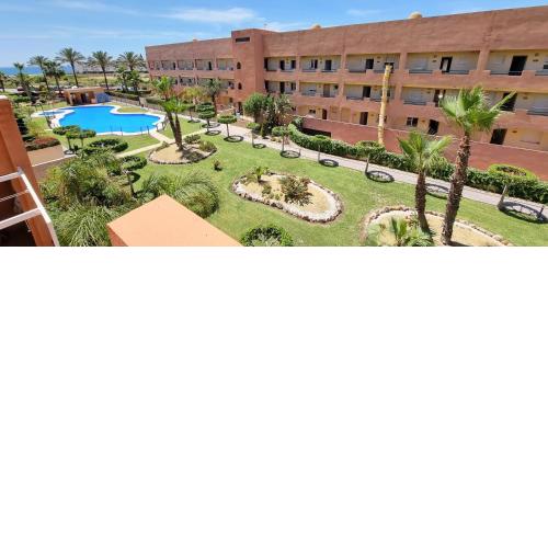 Homes of Spain, Apartamentos Paraiso de Vera Playa, Ed Tahiti, bajo G a pie de la playa, vistas piscina