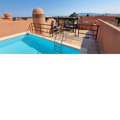 Homes of Spain, Apartamentos Paraiso , Ed Palmerston, Atico K a pie de playa, piscina privada en solarium, WiFi