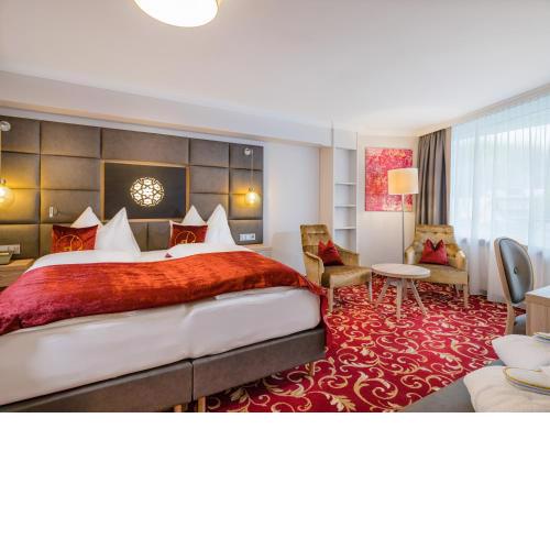 Hotel Norica - Thermenhotels Gastein mit dem Bademantel direkt in die Therme