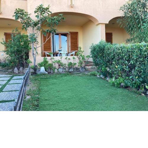 Inviting holiday home in Paduledda with garden