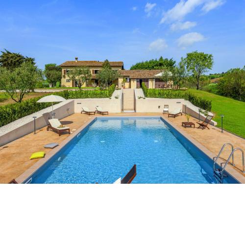 Inviting Holiday Home in San Costanzo with Swimming Pool
