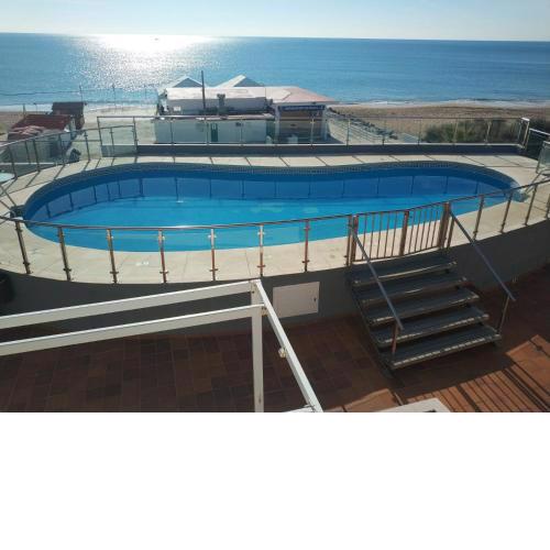 Islantilla-Apartamento con piscina y garaje en primera línea de playa