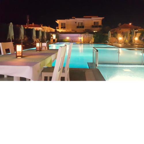 Kamer Suite & Hotel