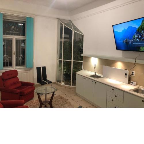 Központi elhelyezkedésű apartman, zárt udvari parkolással