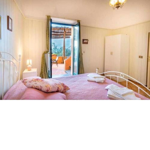 La Maison en rose avec la vue sur Capri