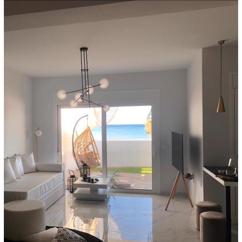 Longbeachvillas 2 Thesia beachfront villa