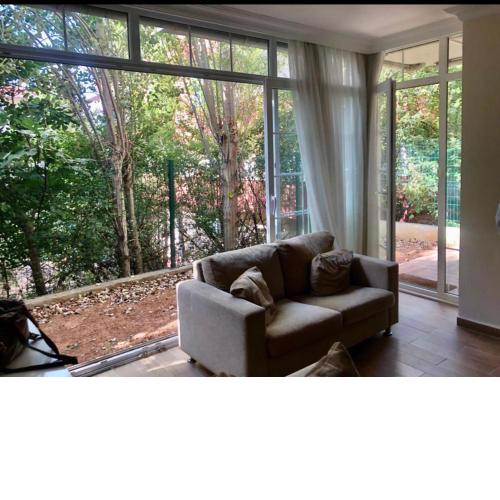 Lovely Escape House in a Frame with Garden