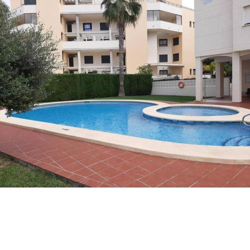 Lovely one bedroom unit with balcony and pool