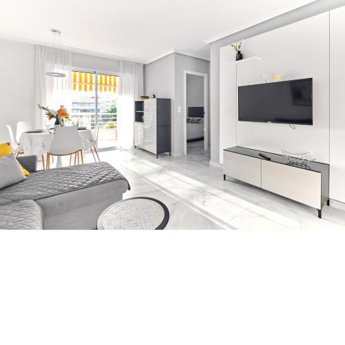lovely sunny apartment with shared pool and private parking