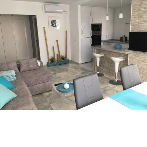 Luminoso apartamento en playa las redes, entorno natural pinares y dunas. Wifi